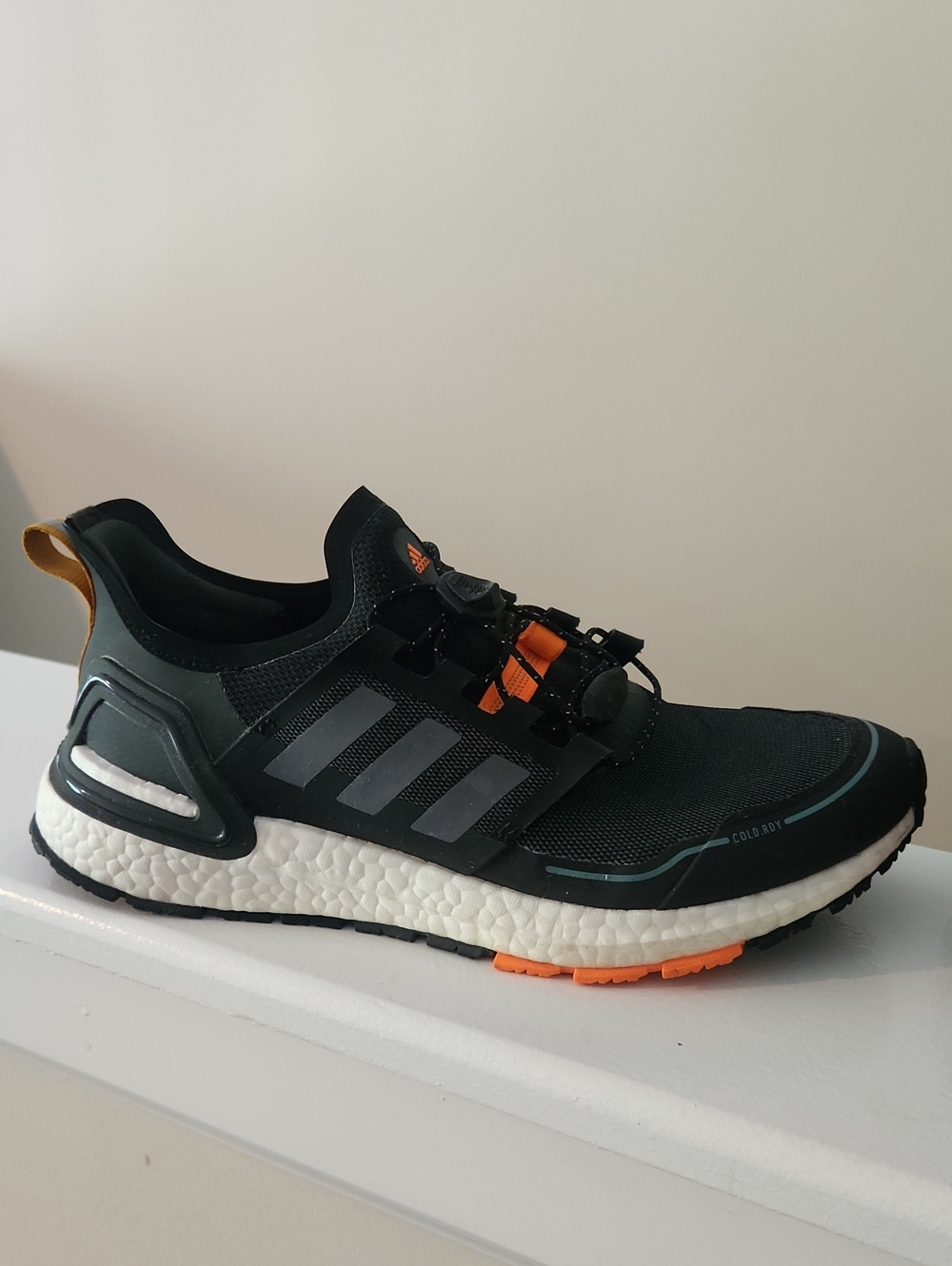 adidas Black Running Shoe with Orange and White Accents